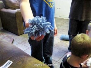 Homemade Pompoms and an Indoor Snowball Fight